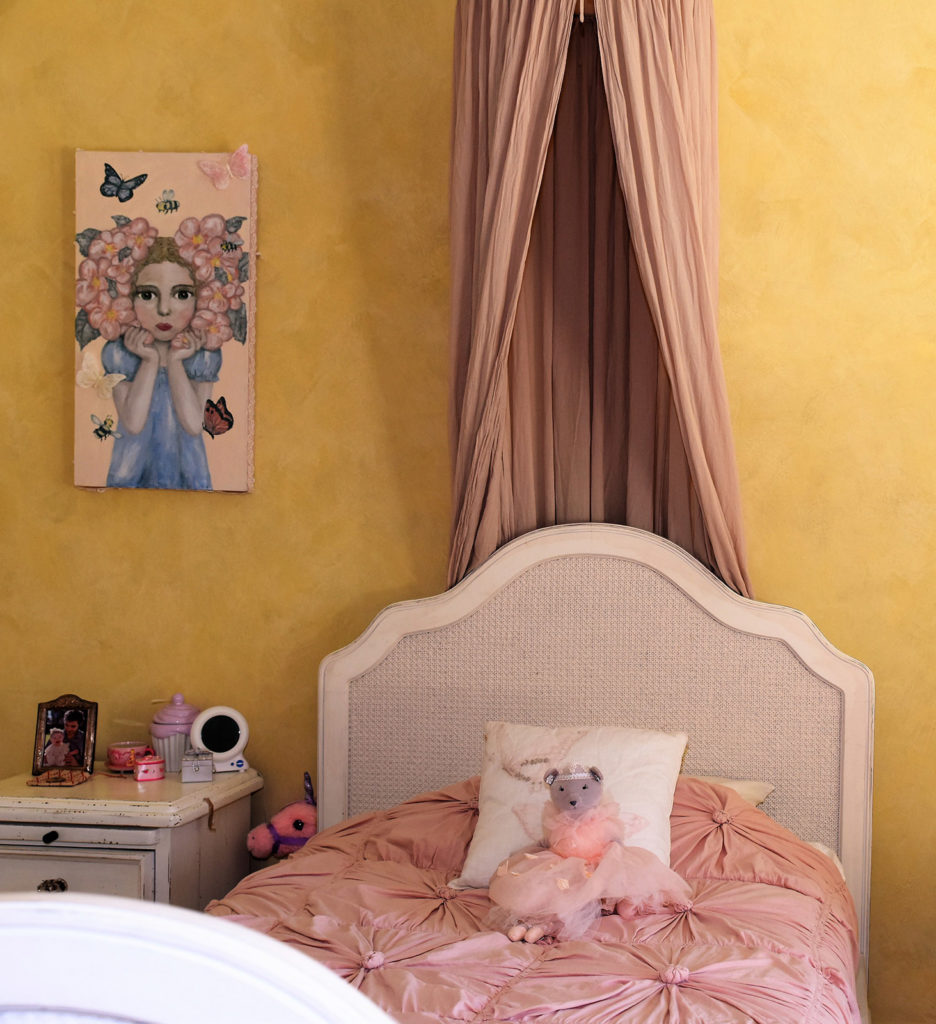 kids bedroom with gold theme